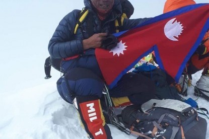 Successful ascent to Summit of Mt. Dhaulagiri with Nepal flag