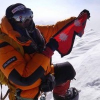 Nepal's flag at Summit of Mt. Dhaulagiri